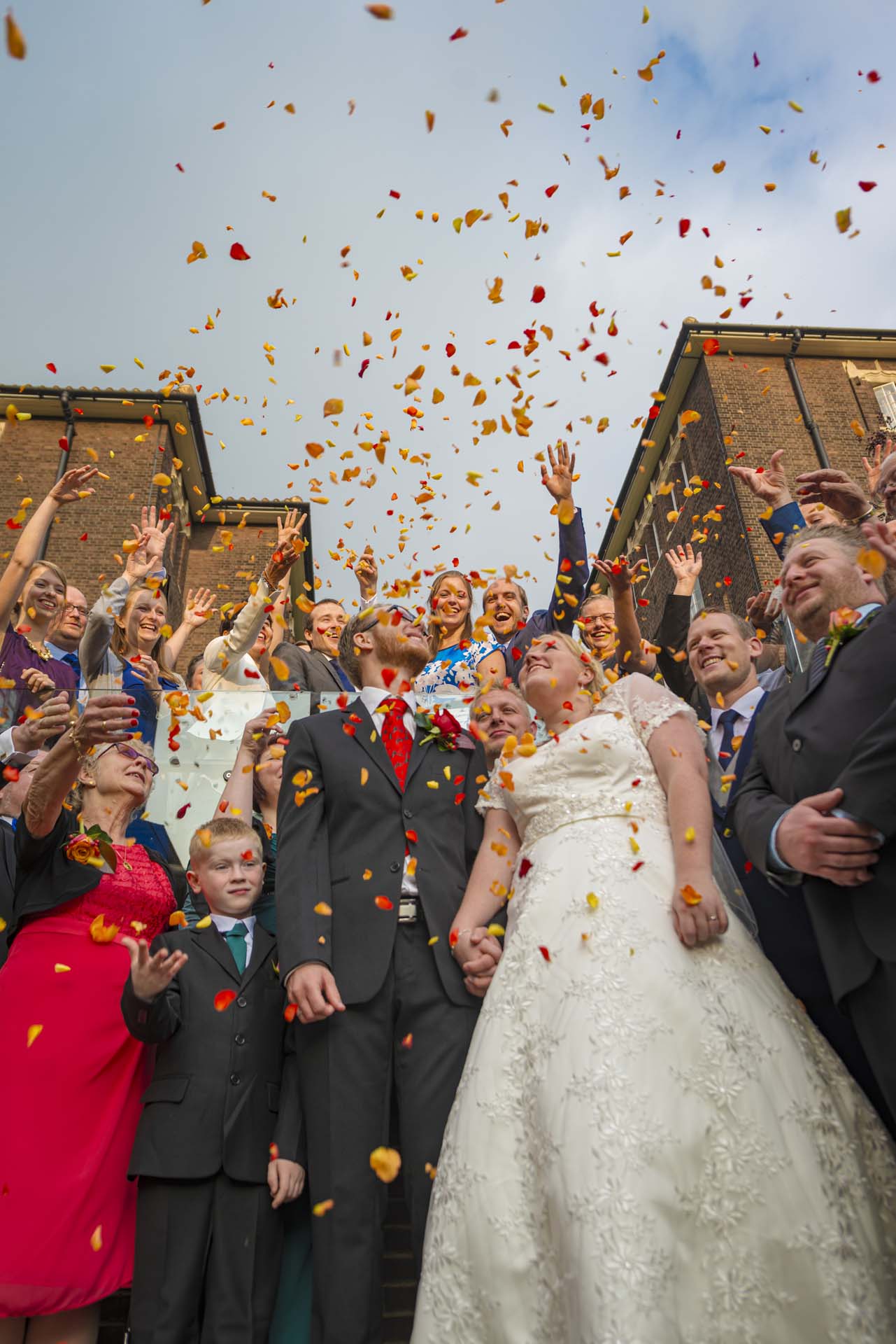 Confetti falling over bride and groom Camberwell south london wedding photographer article on extreme wide angle lenses